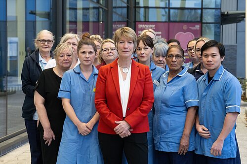 Pippa Heylings, parliamentary candidate for South Cambs, with NHS staff outside hospital