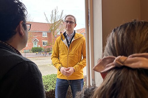 Ian talking to local residents