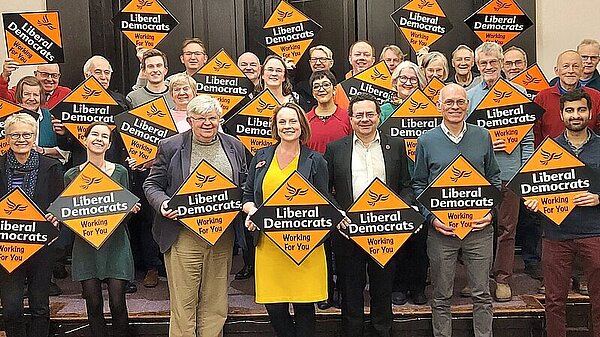 Lib Dem campaigners from Cambridge. Cheney Payne, parliamentary candidate for Cambridge, is standing in the centre with Mark Pack, the party president.