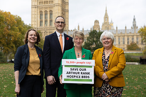 Pippa alongside Ian Sollom MP, Charlotte Cane MP and Cheney Payne, in front of Parliament with the Arthur Rank Hospice Petition